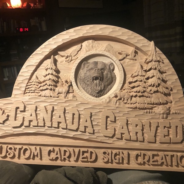 Carved canada sign